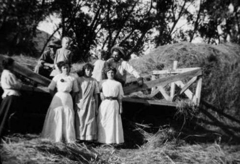 This photo suggests that haying, while hard work, also had a social aspect. The three girls are the Bond sisters, who lived on a ranch northwest of Poncha Springs.