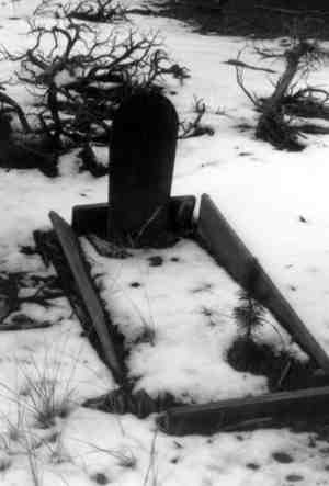 An unidentified child's grave in Evergreen Cemetery is a poignant reminde rof how frequently death took Leadville and Lake County children. (Photo by Stephen M. Voynick)