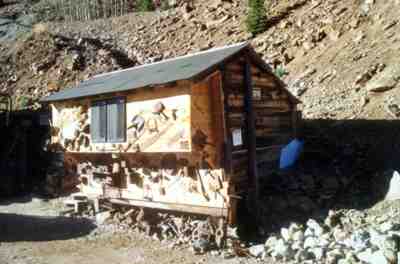 One of the restored mine cabins at the Last Chance Mine. Cabins like these can accommodate as many as 12 overnight guests.(Photo by Stephen F. Voynick.)