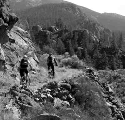 Cyclists south of Granite on remnant of old stage road.