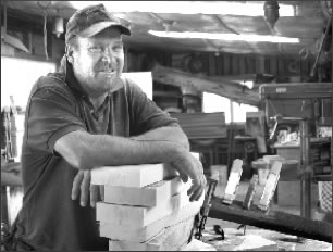 Jim Woddard at his wood shop in Villa Grove.