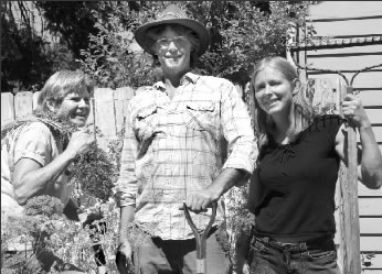Merry Cox, David Bowers and Denise Ackert in the garden. Photo by Mike Rosso