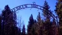 Restored gate to Hebrew Cemetery next to Evergreen Cemetery. Photo by Steve Voynick.