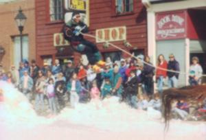 Ski-joring racer catching air on Harrison Avenue