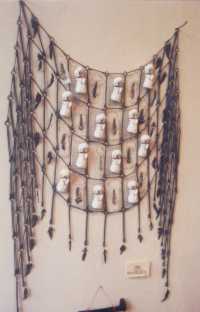 Prayer Shawl -- thematic piece formed of old rusted bed spring