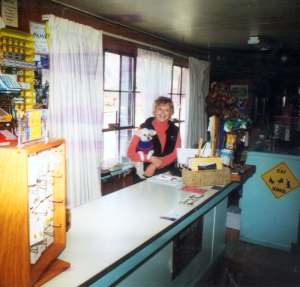 June Hervert at store counter