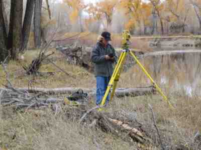 Surveyor at work in Rio Grande bottomlands