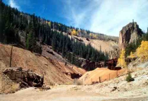 Among the sites along the Bachelor Historic Tour auto route are Nicholas Creede's Amethyst Mine (bottom). The surface structures of the Last Chance Mine appear at the top of the ridge.(Photo by Stephen F. Voynick.)