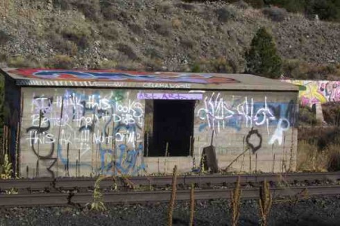 Informal art on an abandoned building at Barrel siding.