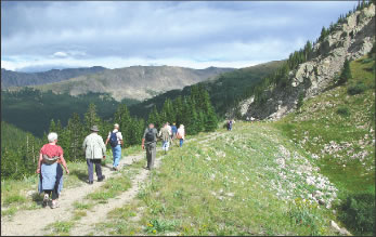 Members of the Colorado Historical Society walk along the old Denver, South Park & Pacific railroad grade on their way back to Hancock.  (Kenneth Jessen)