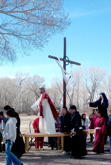 After the Veronicas and the Hermanos from the morada in San Antonio, Colorado meet at El Calvario (The large cross) where Jesus meets Mary, part of the congregation goes on to the morada and the others walk to Our Lady of Guadalupe Church in Conejos, Colorado which is several miles away. Photo by Ruben Archuleta.