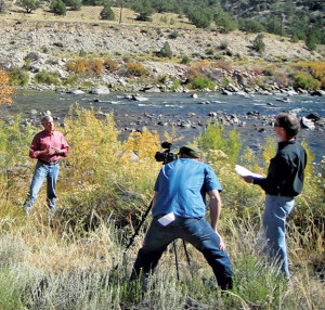 Nathan Ward photographs Colorado Senator Mark Udall while Friends of Browns Canyon member Michael Kunkel looks on. Photo by Susan Mayfield.