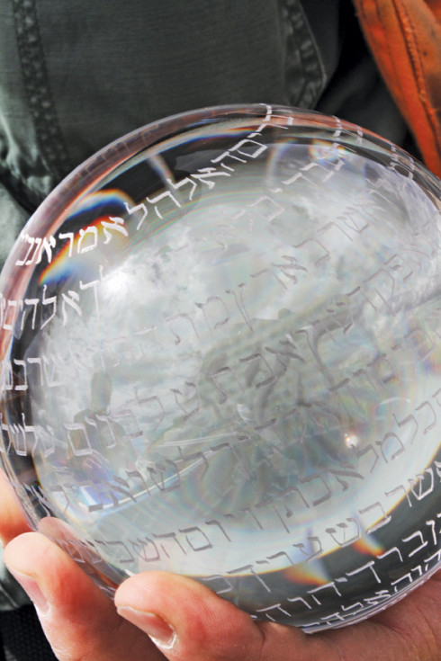 Pictured here is the Torah Ball, a crystal ball engraved with the Ten Commandments in Hebrew, which was buried far beneath Mount Princeton in 2011 by Richard Grossman. Photo by Alex Telthorst.
