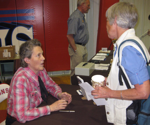 World-famous animal scientist and autism self-advocate, Temple Grandin, speaks to a lecture attendee after giving a talk at the Buena Vista School Gymnasium in 2011. The event was attended by nearly 700.