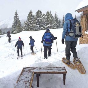 Skiers and snowshoers head out from the hut for some daytime recreation. Photo by Mike Rosso.