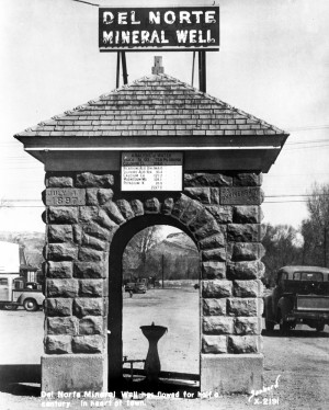 Photo caption reads: “Del Norte Mineral Well has flowed for half a century. In heart of town.” Photo circa 1940s. Courtesy of the Denver Public Library.
