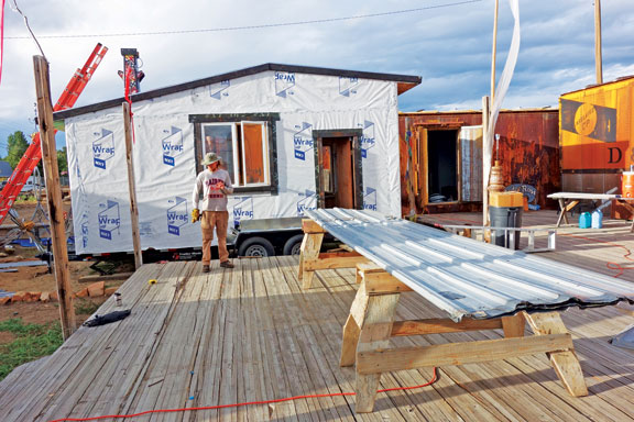 Gunnison resident Callum Curly at work on a 160-square-foot home that he and his partner, Tessa Jonson, plan to live in full -time to accommodate their “nomadic lifestyle.” Photo courtesy of Tessa Jonson.