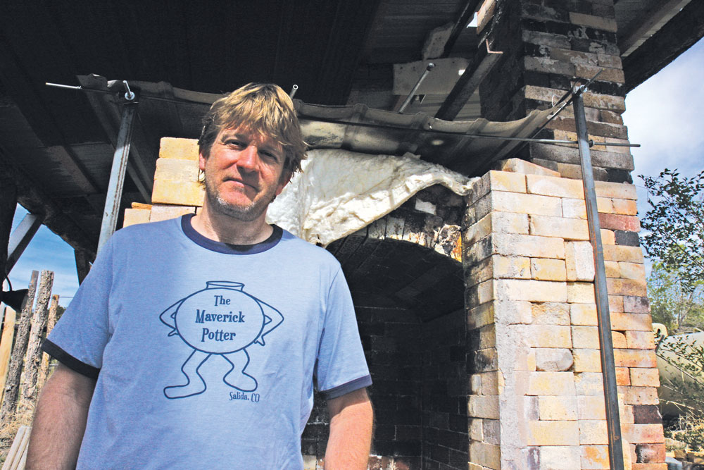 Ceramic artist Mark Rittman in front of his soda fire kiln at his home west of Salida. At left: Mark throwing a large bowl at his gallery and studio in downtown Salida. Photos by Mike Rosso.