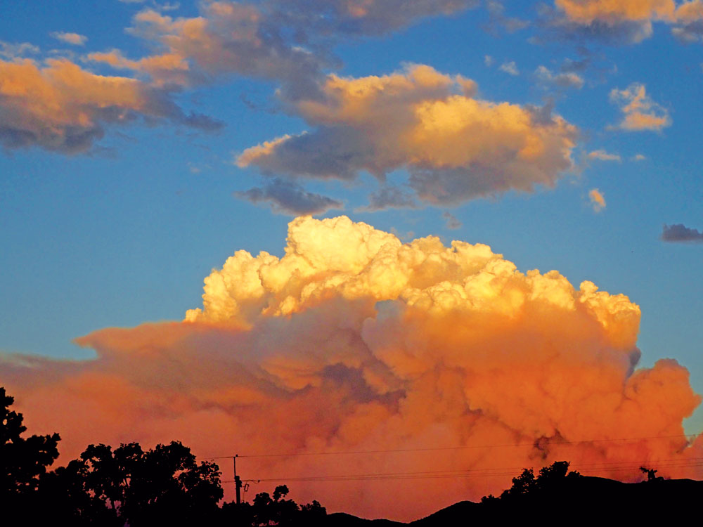Photo of the fire plume taken on July 10 at 7:20 p.m. looking east from Salida. Photo by P.T. Wood.