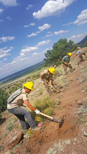 Crews at work  on the Pronghorn Trail.